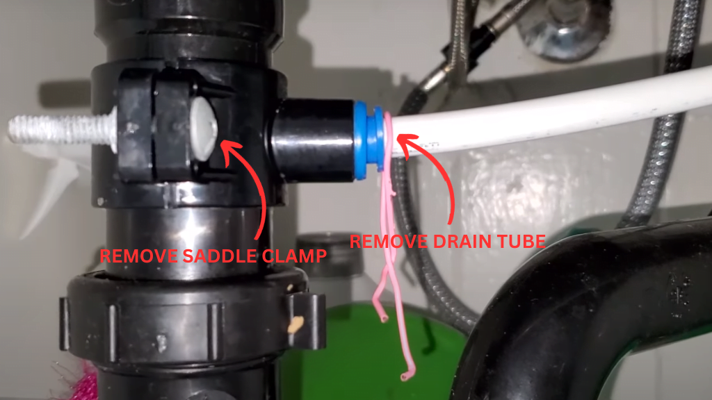 Disconnect the Drain Line and Drain the Saddle Clamp